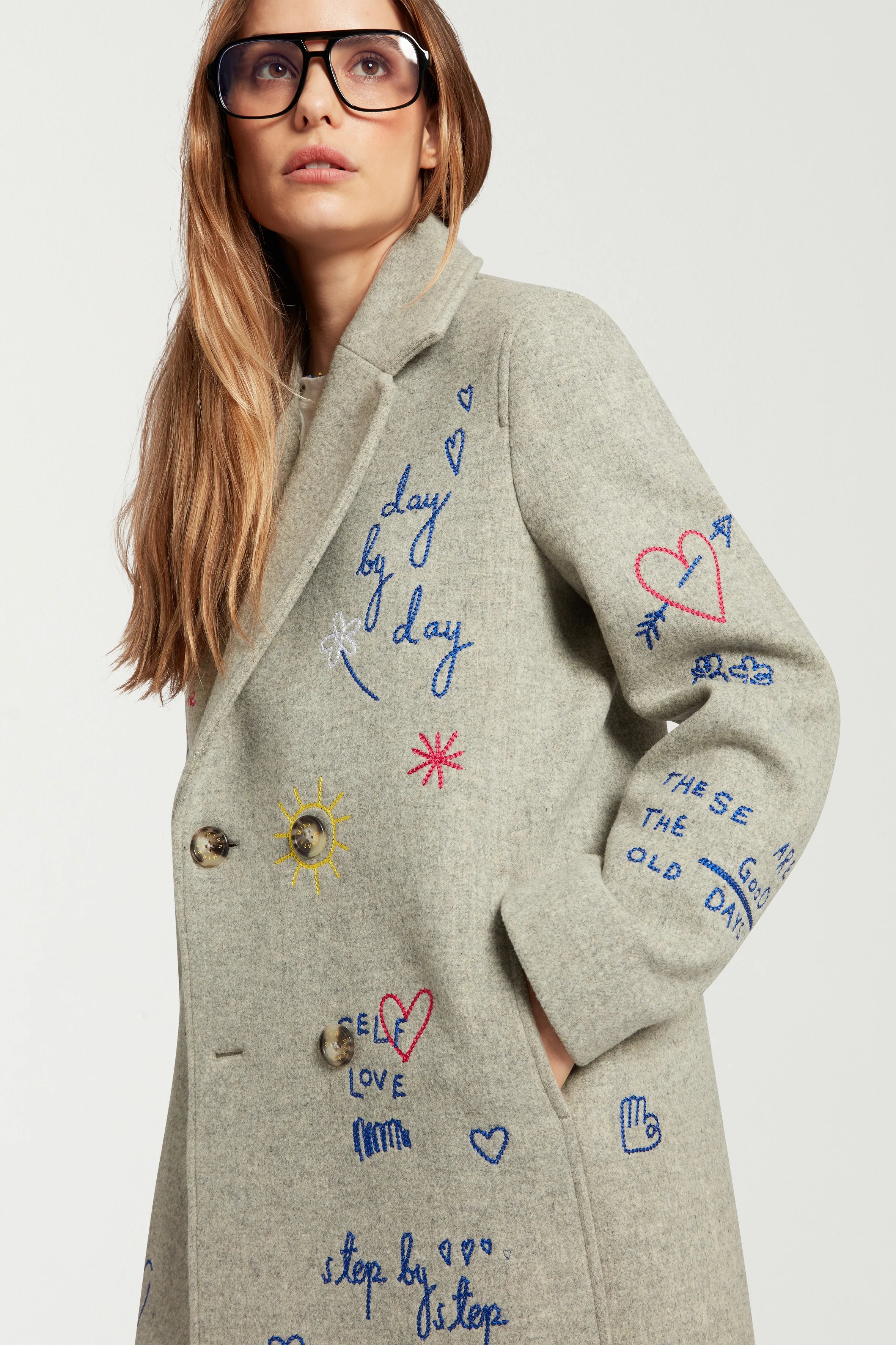 Embroidered scribble coat